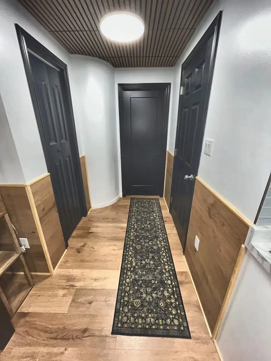 The Den's own hallway, with both bedrooms off it
